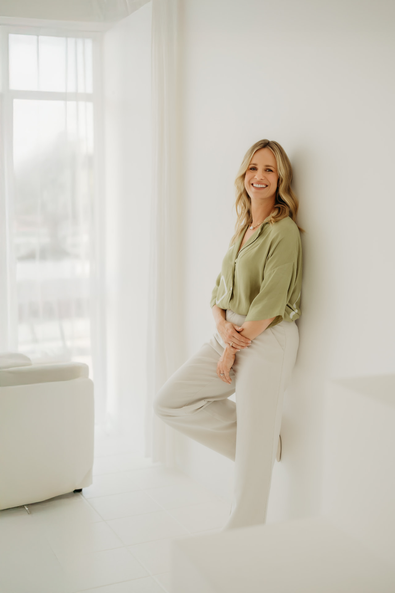 Claire Pitman seated in her studio